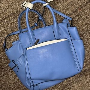 Reed purse light blue. Unused